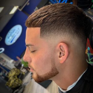 Man with fade haircut and beard trim